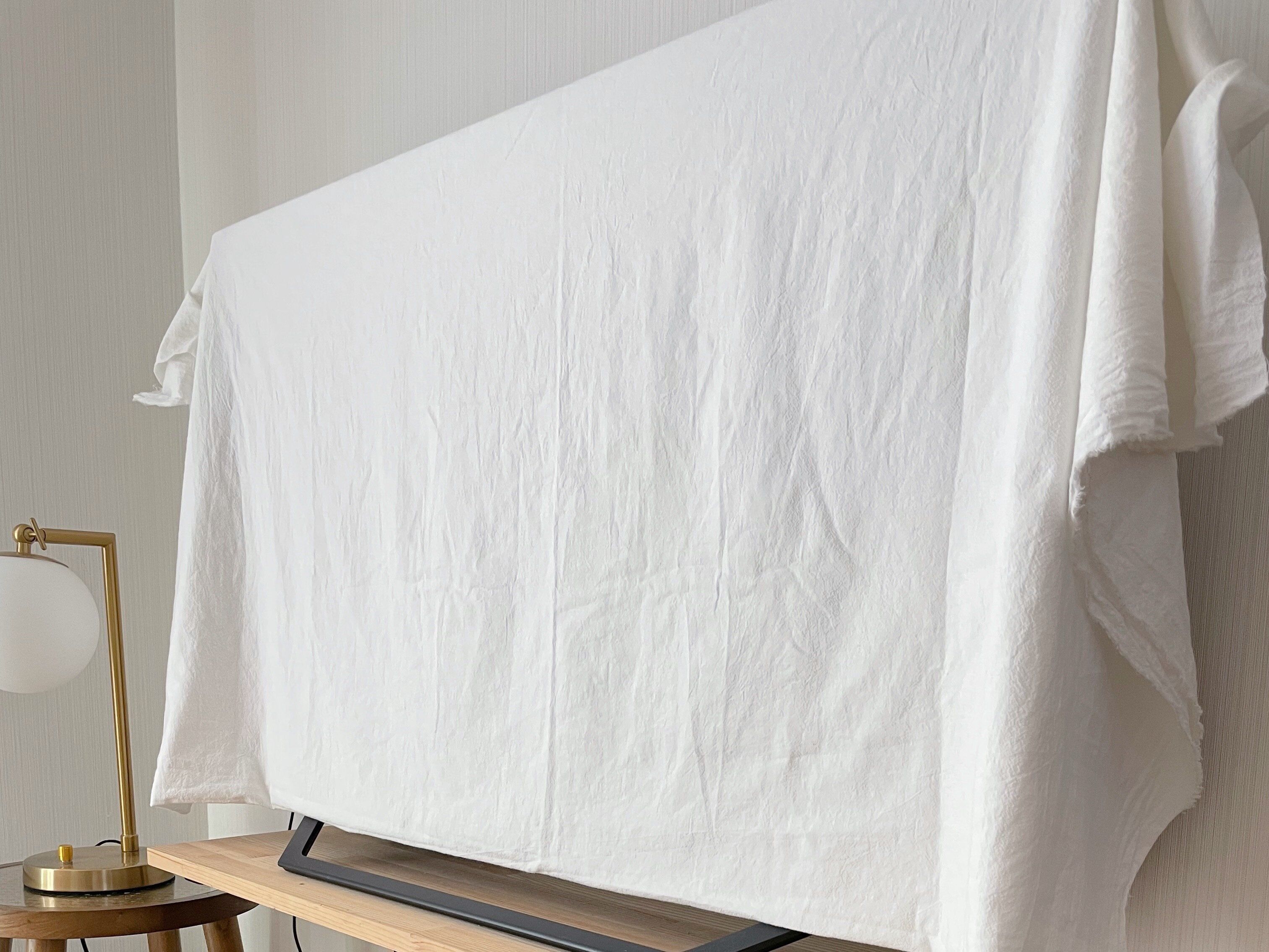 テレビは布で隠す