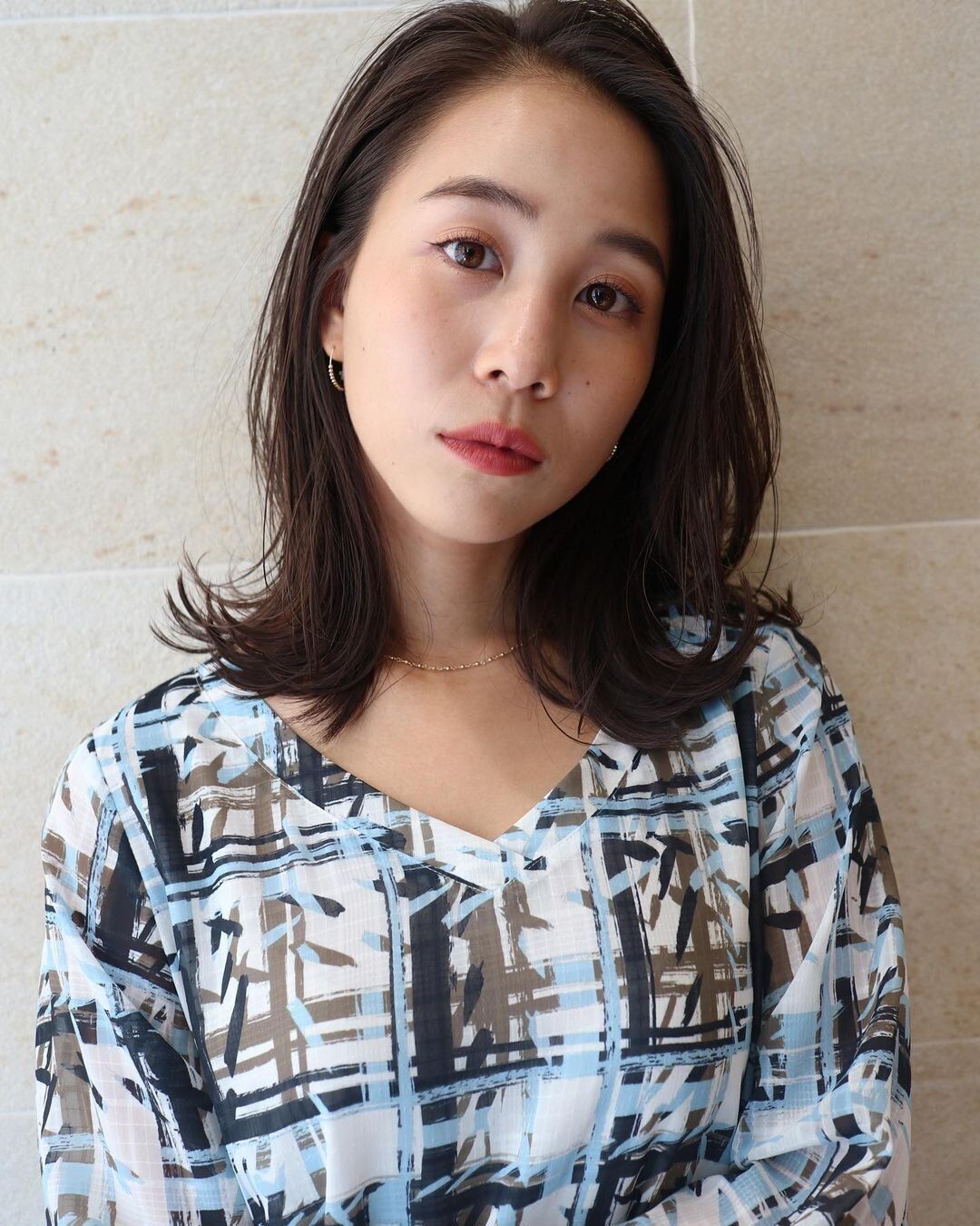 40代女性にもおすすめ!小顔効果もバッチリ!外ハネレイヤーの縦長効果でスッキリ感を