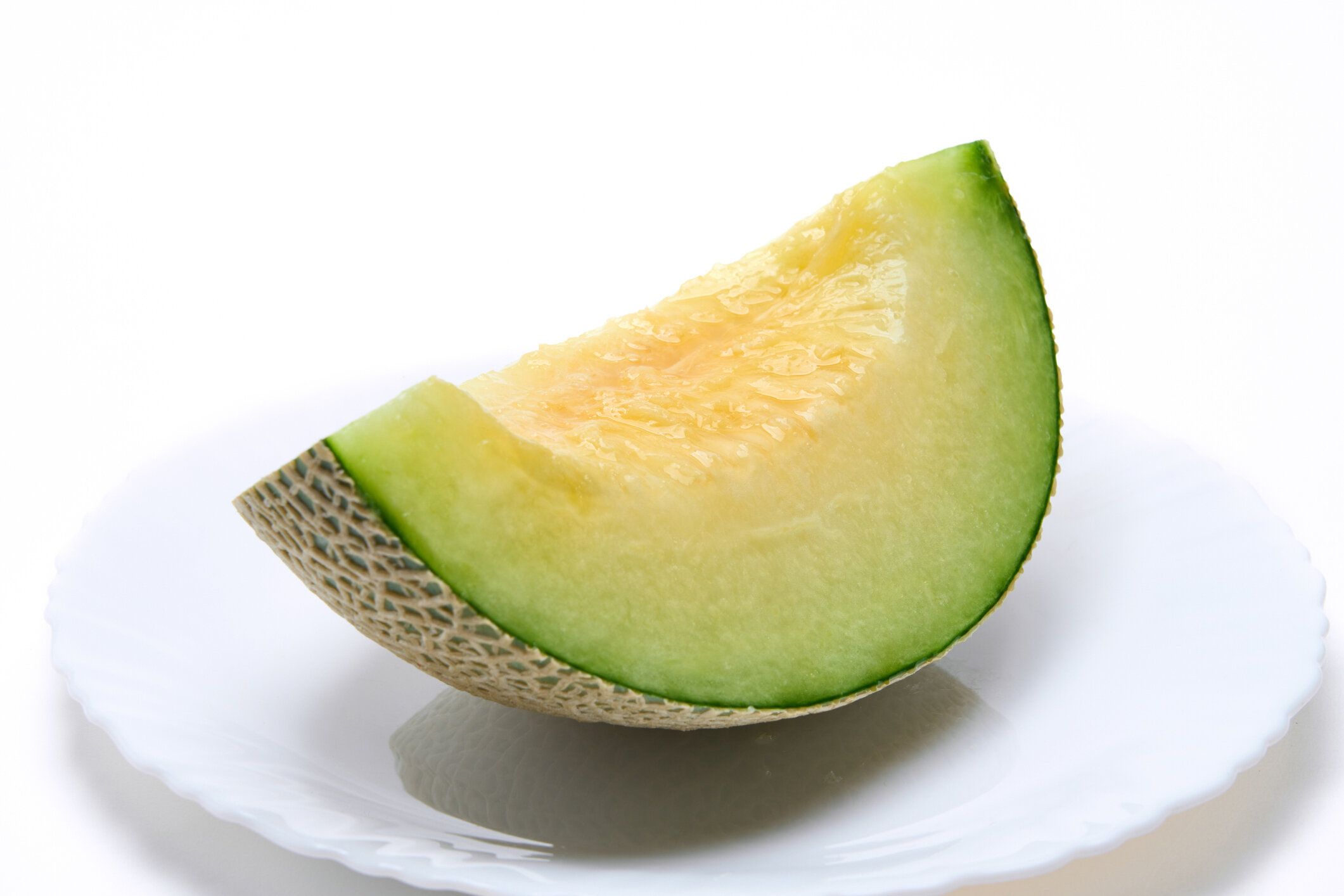 プレートにスライスした伯爵のメロン