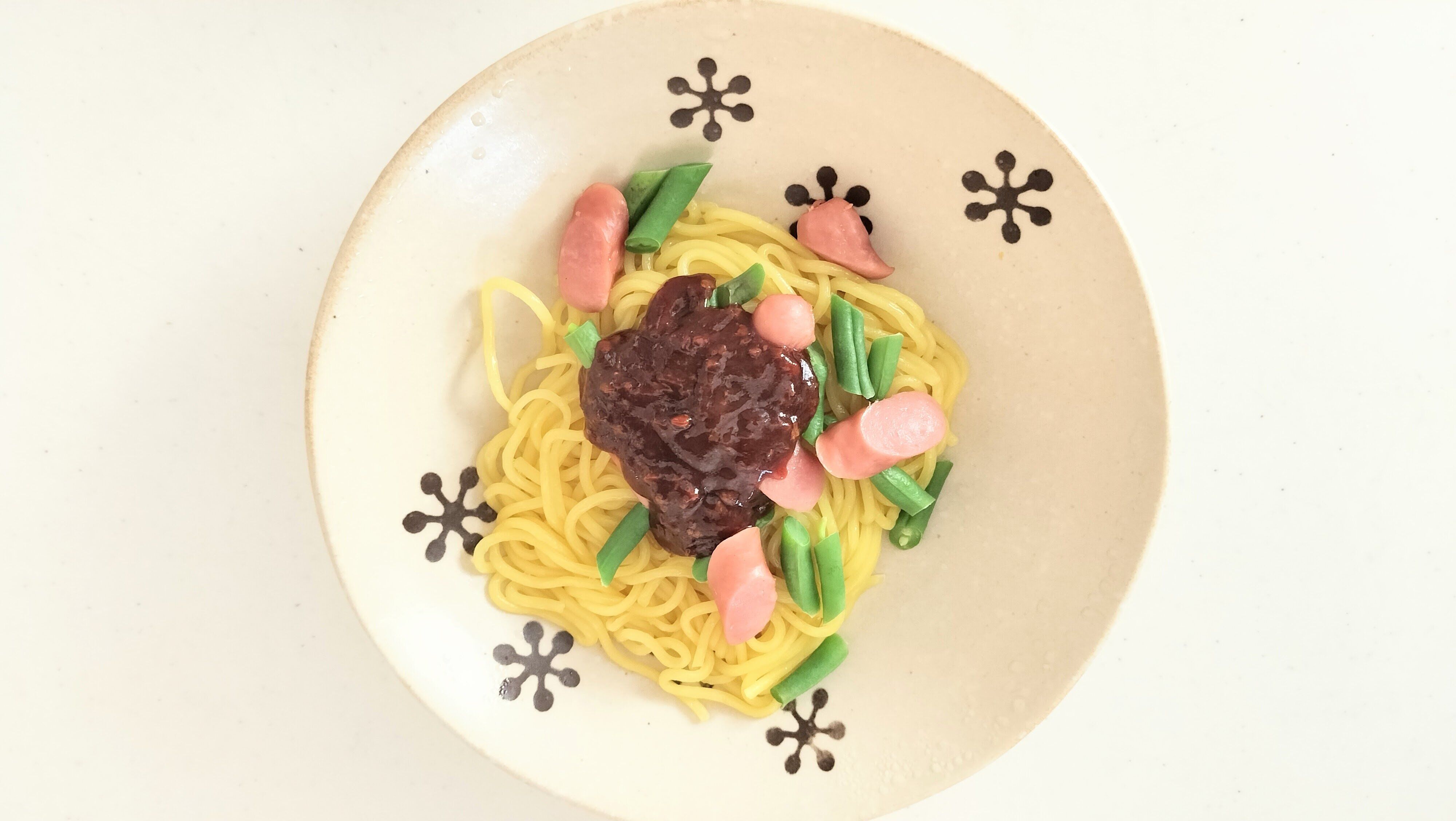 調味料をかけて混ぜるカレーナポリタン