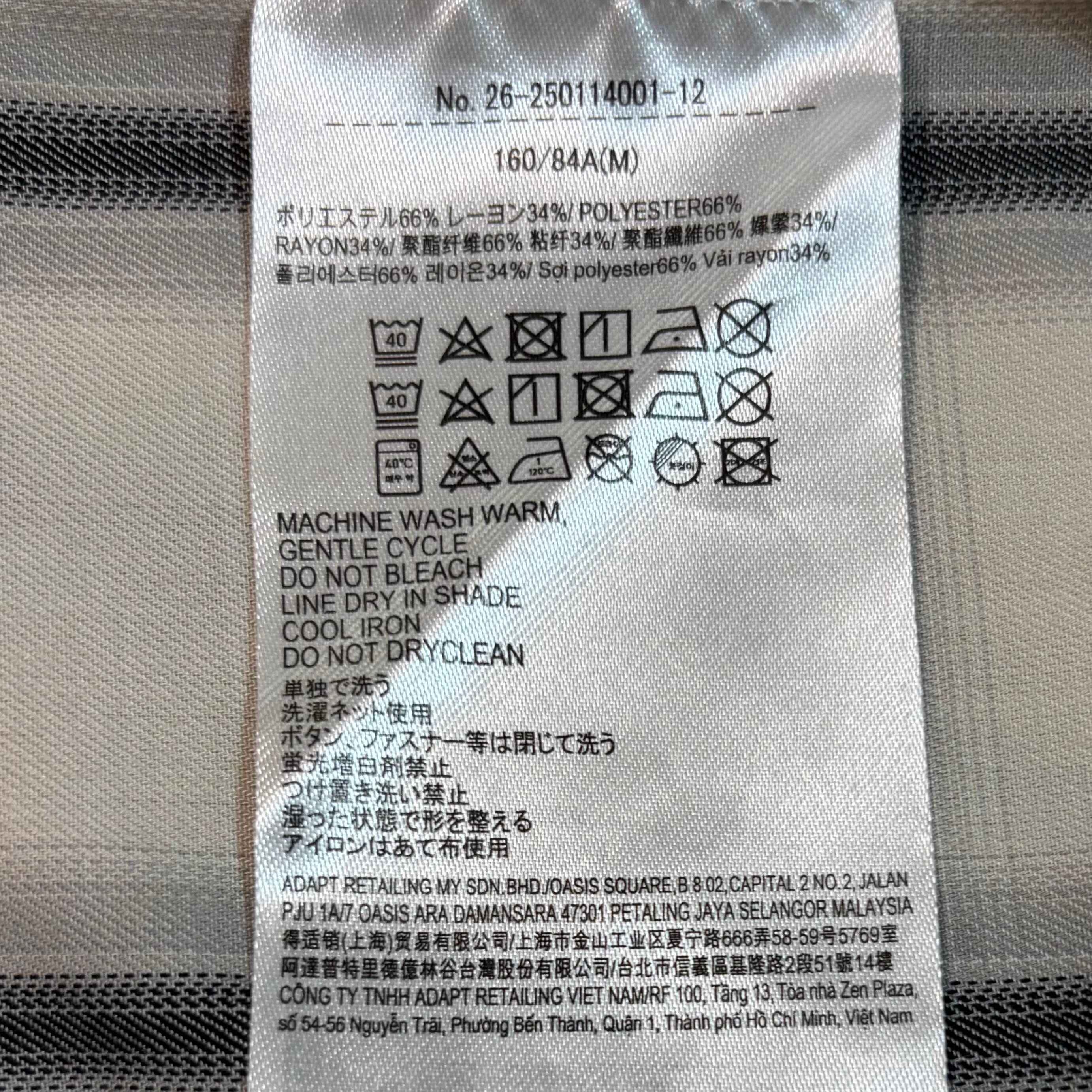 チェックシャツのタグ