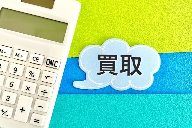 電卓の写真と買取の文字